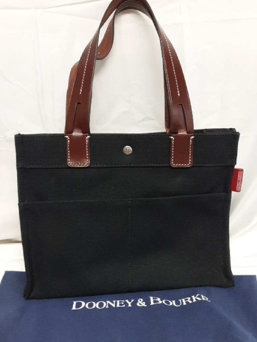 Dooney & Bourke Black Canvas Tote Style Handbag with Brown Leather Handles